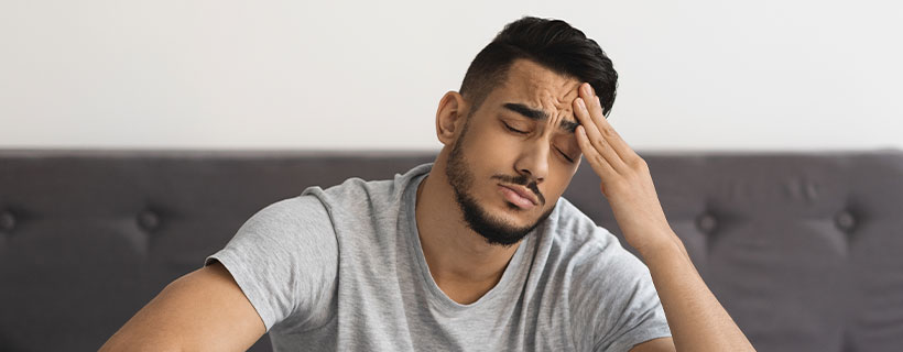 patient needing headache chiropractor in Sherman TX